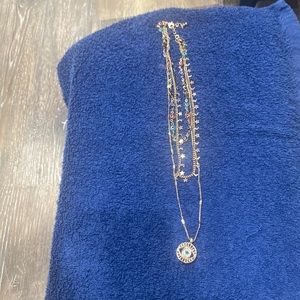 Three chain necklace.